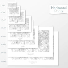 Load image into Gallery viewer, Available sizes for Black Elk Peak, South Dakota topographic maps. 5x7, 8x10, 11x14, 16x20, 18x24, 24x36, and 27x40 posters shown. as black and white prints on a gray background.
