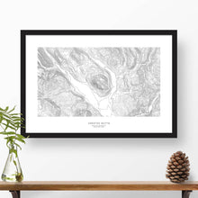 Load image into Gallery viewer, Map wall decor in a black frame. Contour lines of Crested Butte are drawn on a white background. Text below the ski map art can be customized to create custom adventure art.