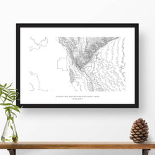 Load image into Gallery viewer, Map wall decor in a black frame. Contour lines of Guadalupe Mountains National Park are drawn on a white background. Text below the map can be customized to create custom adventure art.