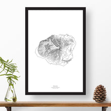Load image into Gallery viewer, Map art print of Kauai, Hawaii with black and white topography in a black 24x36 vertical frame.