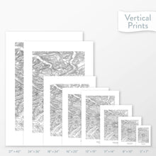 Load image into Gallery viewer, Available sizes for Mount Rainier, Washington topographic maps. 5x7, 8x10, 11x14, 16x20, 18x24, 24x36, and 27x40 posters shown. as black and white prints on a gray background.