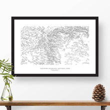Load image into Gallery viewer, Theodore National Park topographic map art poster with black frame.