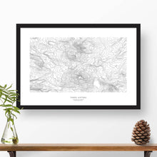 Load image into Gallery viewer, Framed black and white print of Three Sisters, Oregon topography art. Text can be added to create a custom map poster as a travel gift.