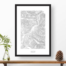 Load image into Gallery viewer, Whistler Ski Resort topographic map poster, 24 inches by 36 inches, in a vertical orientation, with a black solid wood ready-to-hang frame.