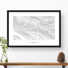 Load image into Gallery viewer, Framed black and white print of Whitefish Mountain, Montana topography art. Text can be added to create a custom map poster as a travel gift.