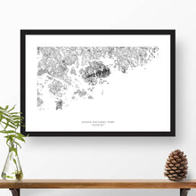 Load image into Gallery viewer, Map wall decor in a black frame. Contour lines of Acadia National Park are drawn on a white background. Text  below the map can be customized to create custom adventure art.
