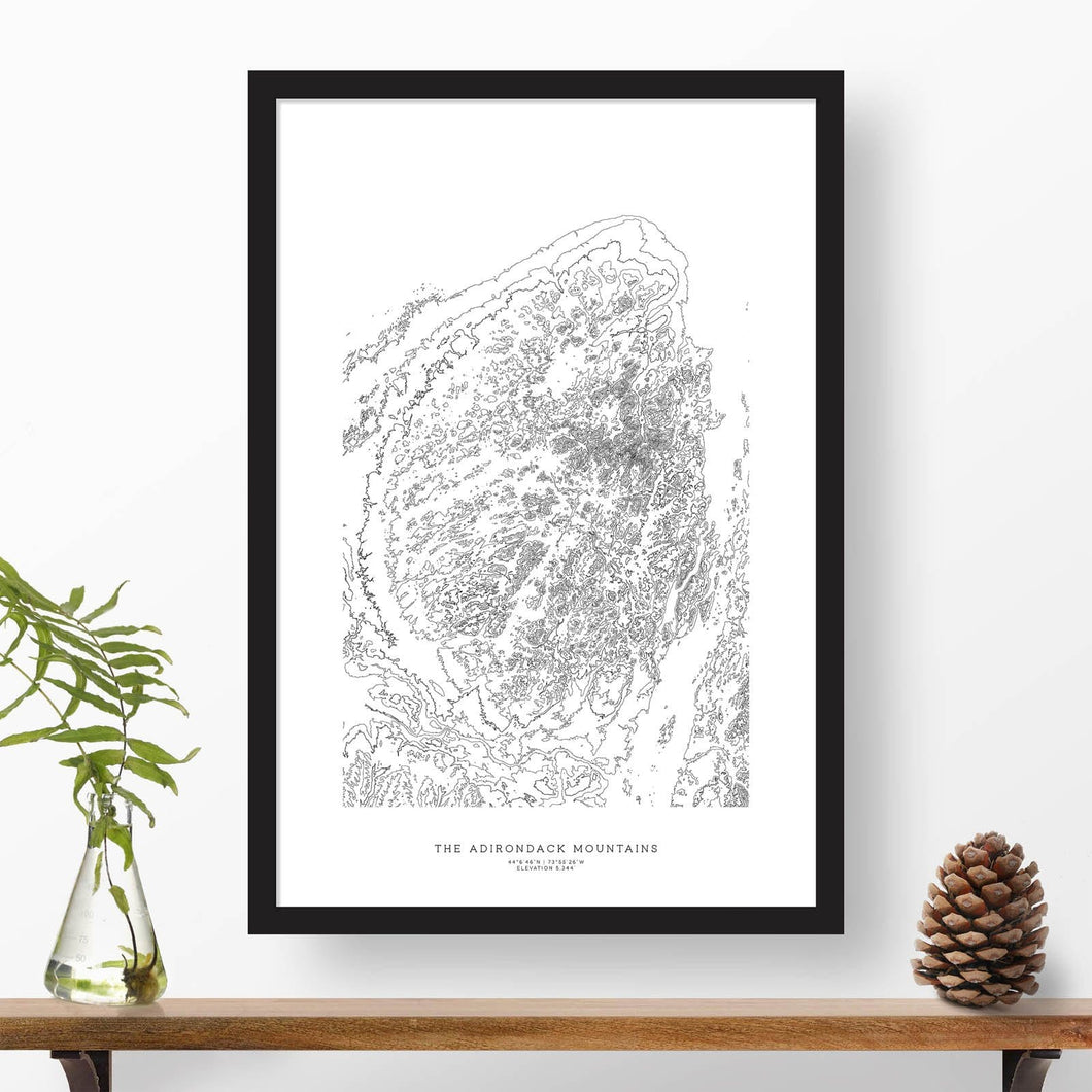 Mountain art print of the Adirondack Mountains with black and white topography in a black 24x36 vertical frame.