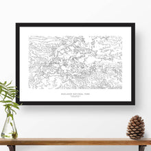 Load image into Gallery viewer, Badlands National Park topographic map art poster with black frame.
