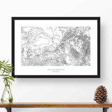 Load image into Gallery viewer, Blue Mountains (the Blues) in Washington and Oregon, featured in a topographic map poster, 24 inches by 36 inches, in a vertical orientation, with a black solid wood ready-to-hang frame.
