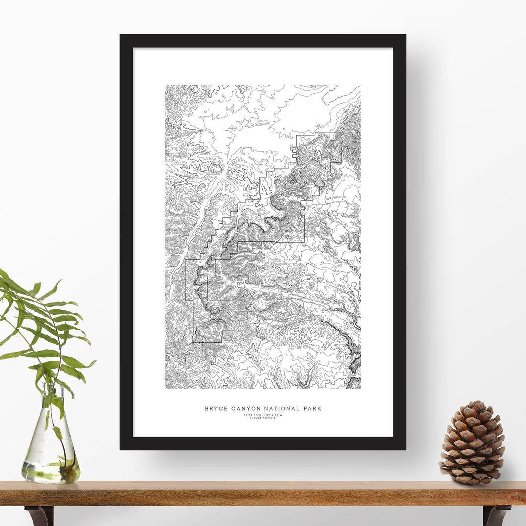 Black and white map and travel art of Bryce Canyon National Park. Topography contours are in black on a white background. Text below the image can be personalized for a perfect custom map art gift idea.