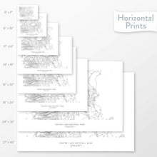 Load image into Gallery viewer, Available sizes for Crater Lake National Park topographic maps. 5x7, 8x10, 11x14, 16x20, 18x24, 24x36, and 27x40 posters shown. as black and white prints on a gray background.
