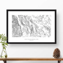 Load image into Gallery viewer, Framed black and white print of Death Valley National Park topography art. Text can be added to create a custom map poster as a travel gift.
