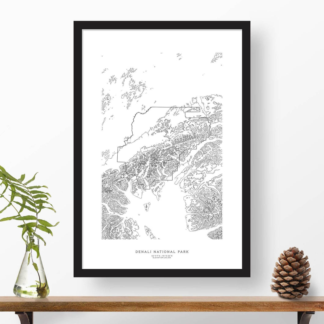Black and white map and travel art of Denali National Park. Topography contours are in black on a white background. Text below the image can be personalized for a perfect custom map art gift idea.