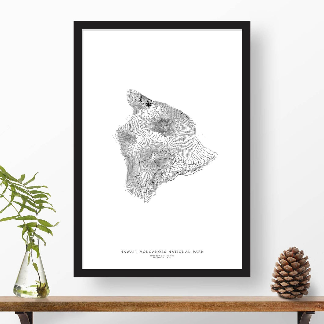 National park print of Hawai'i Volcanoes with black and white topography in a black 24x36 vertical frame.