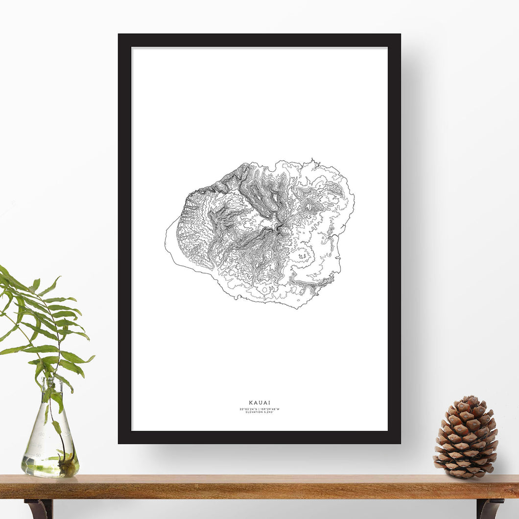 Map art print of Kauai, Hawaii with black and white topography in a black 24x36 vertical frame.