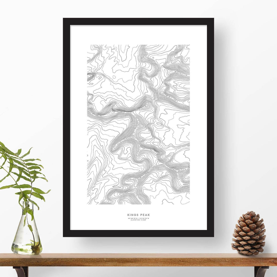 Black and white map and travel art of Kings Peak, Utah. Topography contours are in black on a white background. Text below the image can be personalized for a perfect custom map art gift idea.