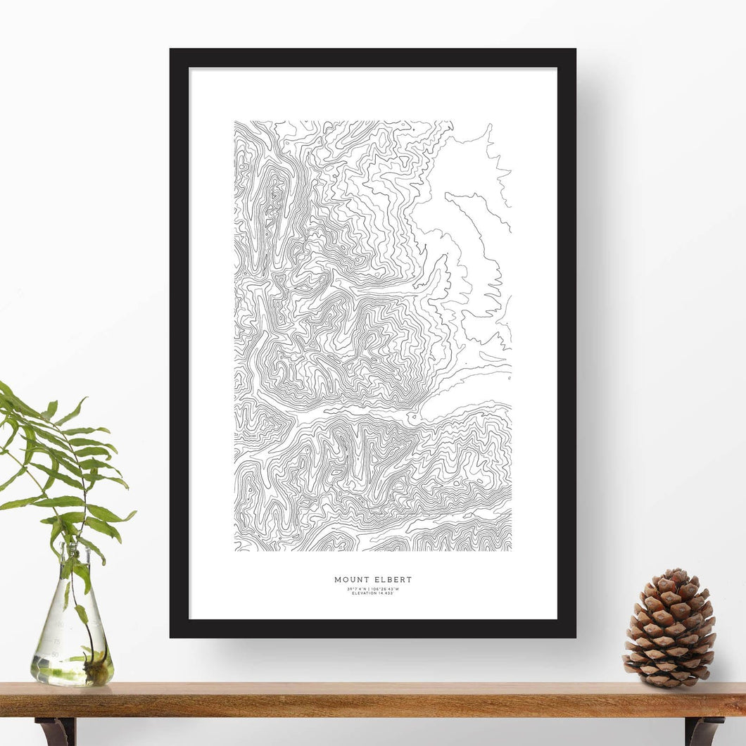 Black and white map and travel art of Mount Elbert, Colorado. Topography contours are in black on a white background. Text below the image can be personalized for a perfect custom map art gift idea.
