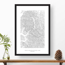 Load image into Gallery viewer, Framed print of North Cascades National Park featuring a topographic map.
