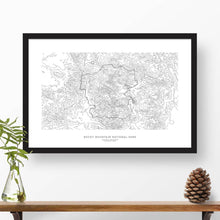 Load image into Gallery viewer, Rocky Mountain National Park topographic map art poster with black frame.
