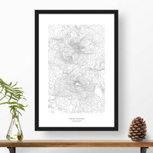 Load image into Gallery viewer, Three Sisters, Oregon topographic map poster, 24 inches by 36 inches, in a vertical orientation, with a black solid wood ready-to-hang frame.
