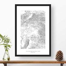 Load image into Gallery viewer, National park print of Yellowstone National Park with black and white topography in a black 24x36 vertical frame.
